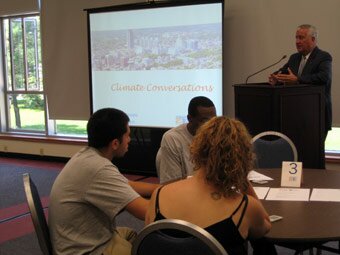 Mayor Jennings Welcomes a group of citizens to the Climate Conversations held the last week of June.